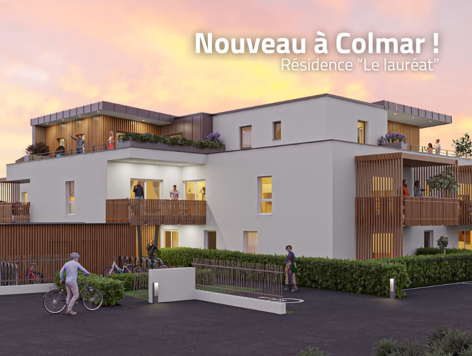 Résidence Le Lauréat à Colmar – Programme neuf avec balcons boisés et terrasses végétalisées, au coucher du soleil.
